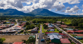 Beautiful aerial view of San Carlos La Fortuna Town Arenal Volcano la Fortuna Church in Costa Rica Arenal Volcano Beautiful aerial view of San Carlos La Fortuna Town - Arenal Volcano la Fortuna Church in Costa Rica