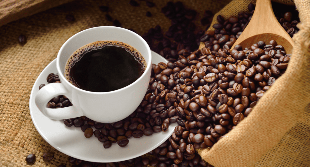 Coffee on a Cup and coffee beans SJO Coffee on a Cup and coffee beans