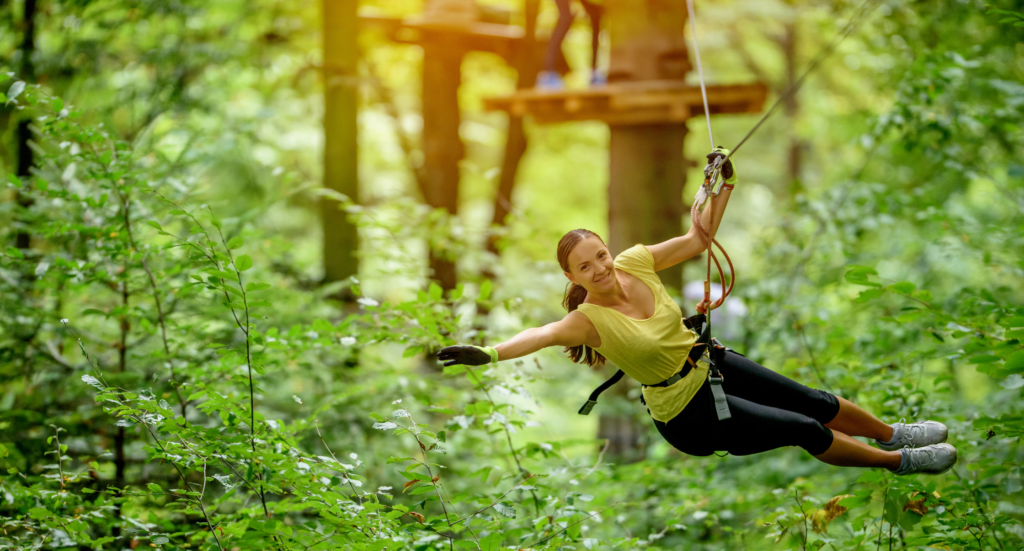 flying over forest with zip line