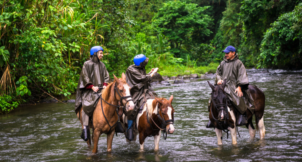 Horseback riding on foot of Volcano Arenal, Costa Rica